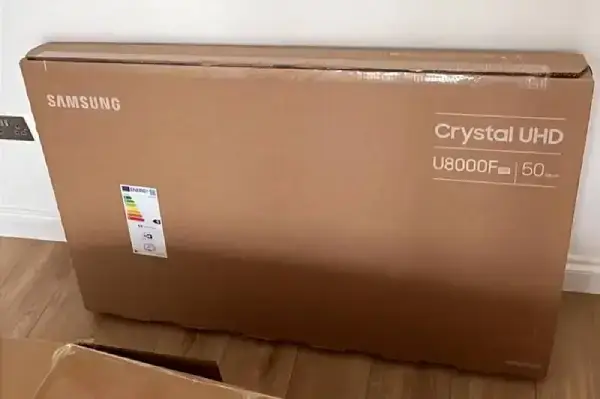 television Cardboard Box leaned on a wall